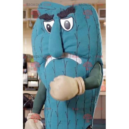 Mascote cacto azul gigante com saco de pancadas - Redbrokoly.com