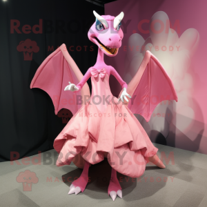 Pink Pterodactyl mascot costume character dressed with a Ball Gown and Bow ties