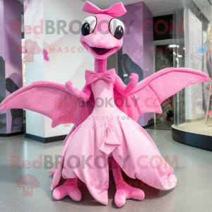 Pink Pterodactyl mascot costume character dressed with a Ball Gown and Bow ties