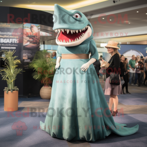 Olive Megalodon mascot costume character dressed with a Evening Gown and Caps