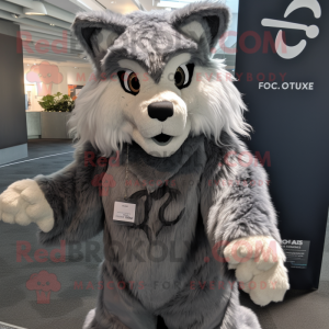 Gray Lynx mascot costume character dressed with a T-Shirt and Shawls