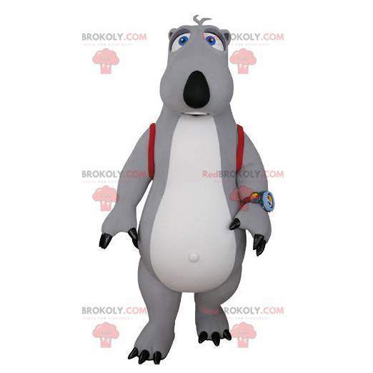 Grå og hvid bjørnemaskot med en skoletaske - Redbrokoly.com