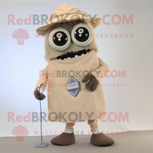 Beige Cyclops mascot costume character dressed with a Bermuda Shorts and Tie pins