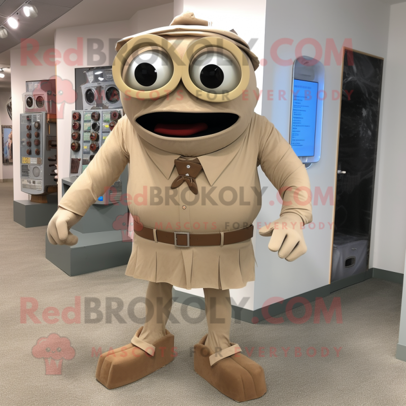 Beige Cyclops mascot costume character dressed with a Bermuda Shorts and Tie pins Beige Cyclops mascot costume character dressed with a Bermuda Shorts and Tie pins