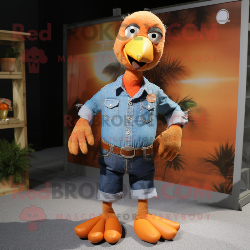 Orange Turkey mascot costume character dressed with a Chambray Shirt and Belts