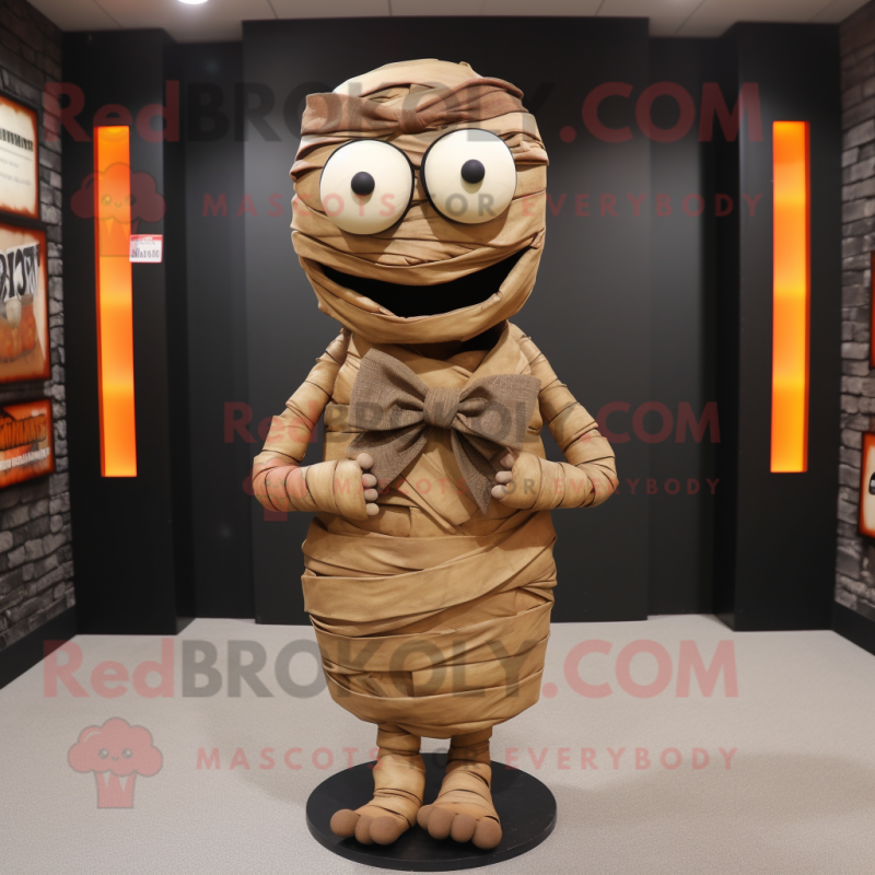 Rust Mummy mascot costume character dressed with a Vest and Bow ties Rust Mummy mascot costume character dressed with a Vest and Bow ties
