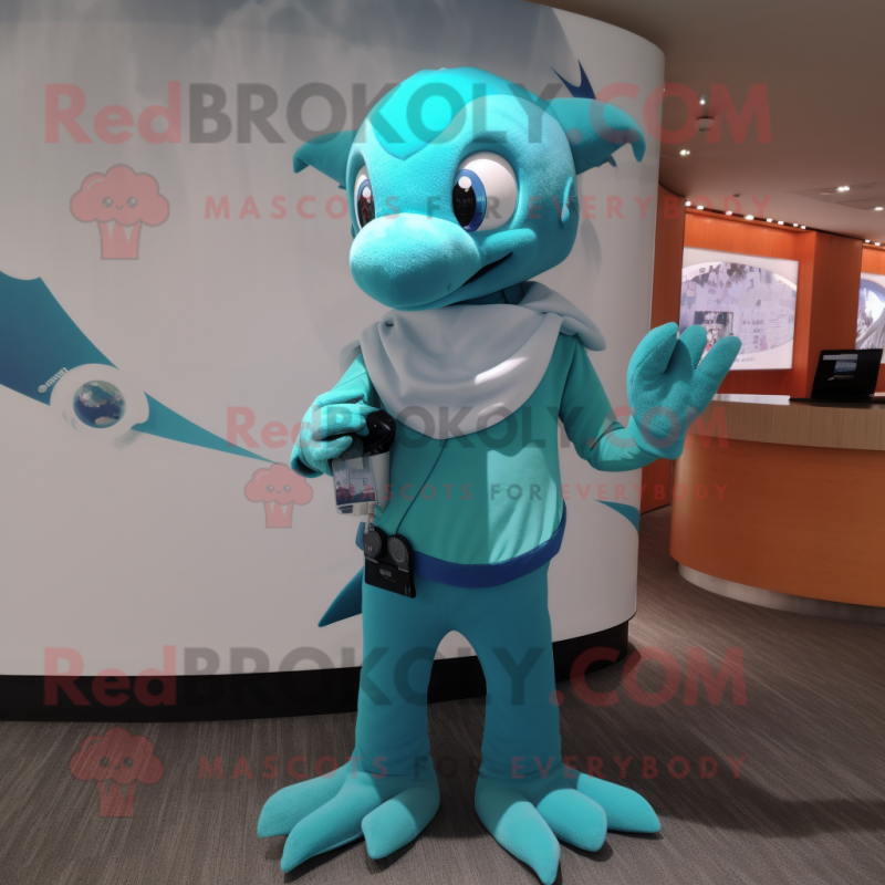 Turquoise Dolphin mascot costume character dressed with a Bikini and Digital watches Turquoise Dolphin mascot costume character dressed with a Bikini and Digital watches