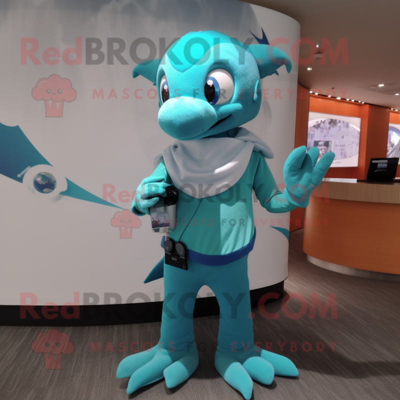 Turquoise Dolphin mascot costume character dressed with a Bikini and Digital watches