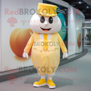 Cream Mango mascot costume character dressed with a Culottes and Cufflinks