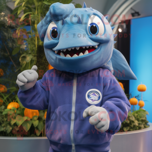 Blue Piranha mascot costume character dressed with a Sweatshirt and Rings