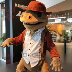 Rust Komodo Dragon mascot costume character dressed with a Culottes and Hat pins
