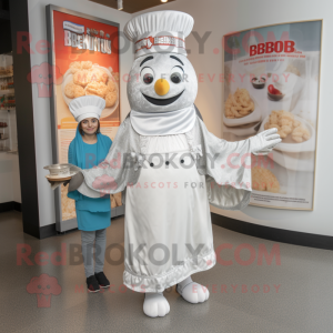 Silver Butter Chicken mascot costume character dressed with a Wrap Skirt and Berets