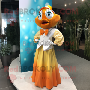 Gold Clown Fish mascot costume character dressed with a Maxi Dress and Bow ties