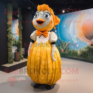 Gold Clown Fish mascot costume character dressed with a Maxi Dress and Bow ties