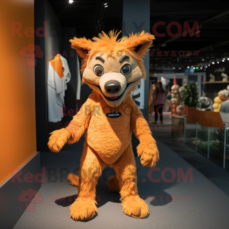Orange Hyena mascot costume character dressed with a T-Shirt and Shoe clips Orange Hyena mascot costume character dressed with a T-Shirt and Shoe clips