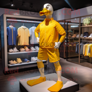 Yellow Geese mascot costume character dressed with a Running Shorts and Belts