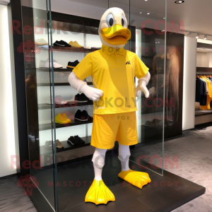 Yellow Geese mascot costume character dressed with a Running Shorts and Belts