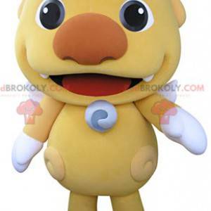 Mascote monstrinho amarelo com asas brancas - Redbrokoly.com