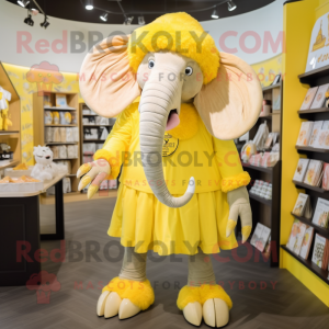 Lemon Yellow Mammoth mascot costume character dressed with a Skirt and Berets