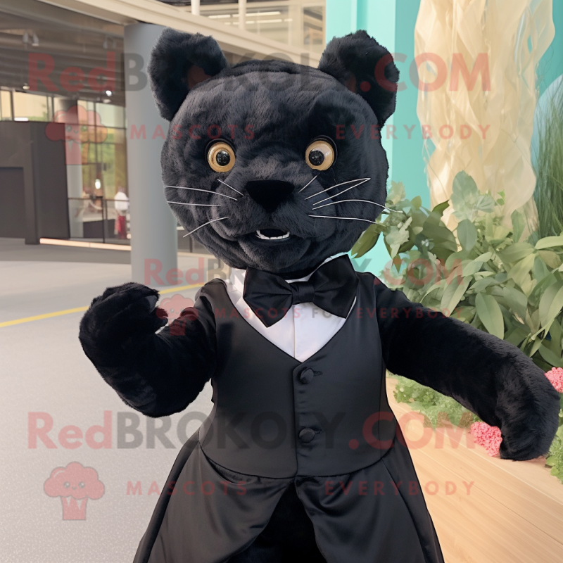 Black Jaguarundi mascot costume character dressed with a Evening Gown and Bow ties Black Jaguarundi mascot costume character dressed with a Evening Gown and Bow ties