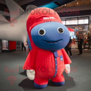 Red Blue Whale mascot costume character dressed with a Chinos and Hair clips