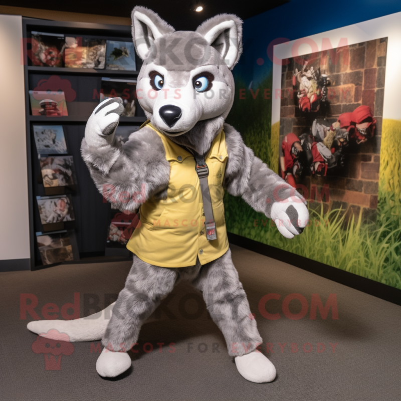 Gray Dingo mascot costume character dressed with a Vest and Foot pads