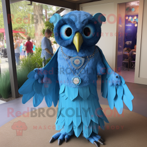 Blue Owl mascot costume character dressed with a Empire Waist Dress and Necklaces