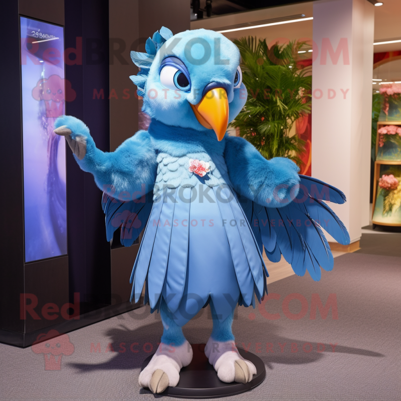 Sky Blue Parrot mascot costume character dressed with a A-Line Skirt and Hairpins Sky Blue Parrot mascot costume character dressed with a A-Line Skirt and Hairpins