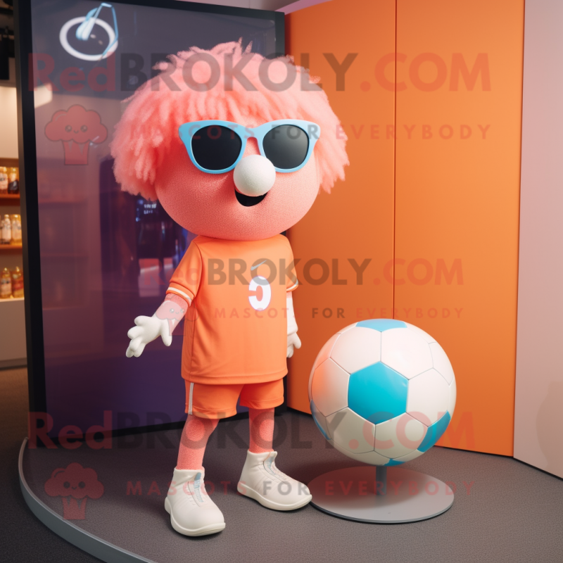 Peach Soccer Ball mascot costume character dressed with a Playsuit and Eyeglasses Peach Soccer Ball mascot costume character dressed with a Playsuit and Eyeglasses