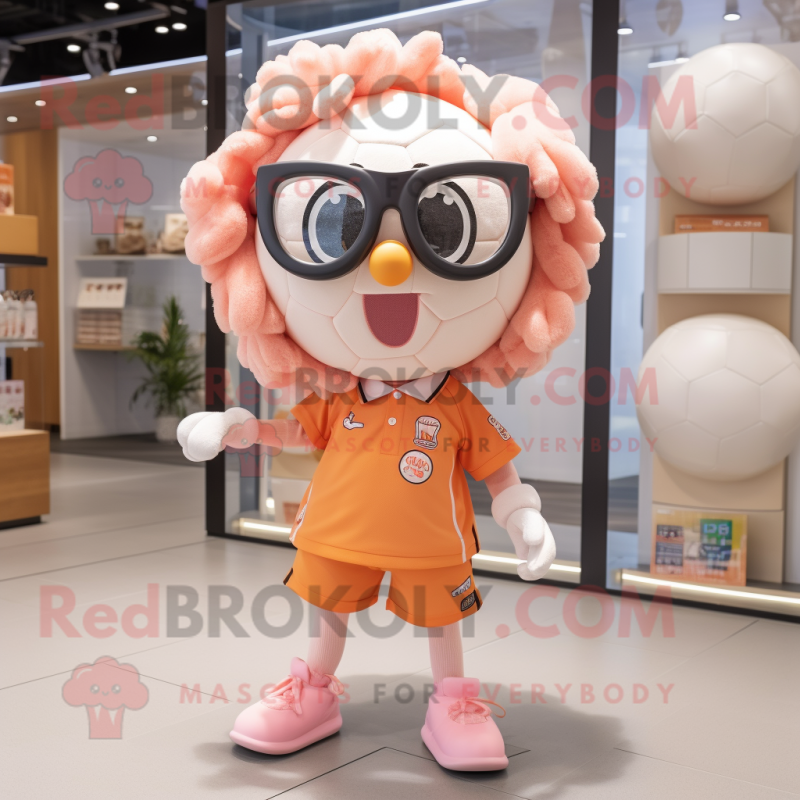 Peach Soccer Ball mascot costume character dressed with a Playsuit and Eyeglasses Peach Soccer Ball mascot costume character dressed with a Playsuit and Eyeglasses