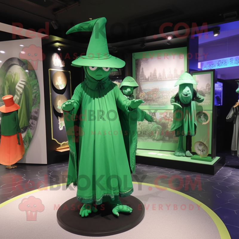 Green Witch'S Hat mascot costume character dressed with a Long Sleeve Tee and Berets