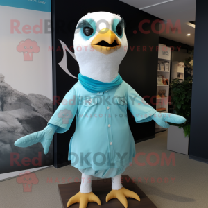 Turquoise Seagull mascot costume character dressed with a Poplin Shirt and Headbands