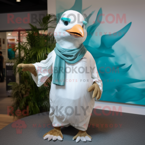 Turquoise Seagull mascot costume character dressed with a Poplin Shirt and Headbands