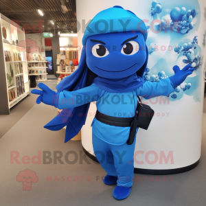 Blue Ninja mascot costume character dressed with a Wrap Skirt and Messenger bags