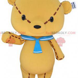 Giant yellow teddy bear mascot with a sailor hat -