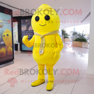 Lemon Yellow Candy mascot costume character dressed with a Skinny Jeans and Scarf clips