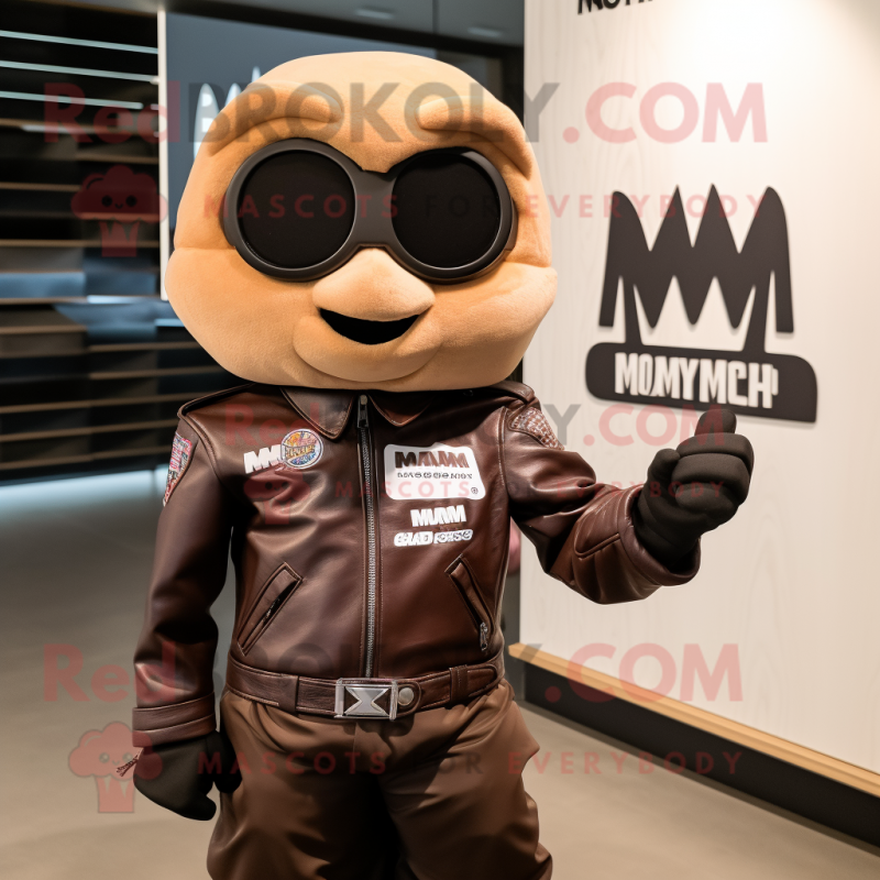 Brown Plum mascot costume character dressed with a Moto Jacket and Earrings