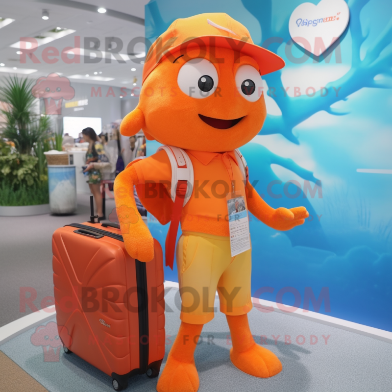 Orange Goldfish mascot costume character dressed with a Swimwear and Briefcases Orange Goldfish mascot costume character dressed with a Swimwear and Briefcases