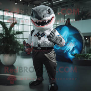 Black Megalodon mascot costume character dressed with a Poplin Shirt and Smartwatches