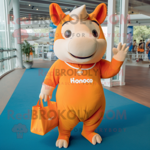 Orange Rhinoceros mascot costume character dressed with a Bikini and Tote bags