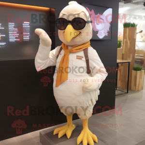 Beige Chicken mascot costume character dressed with a Long Sleeve Tee and Sunglasses