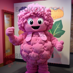 Pink Cauliflower mascot costume character dressed with a Sweater and Mittens