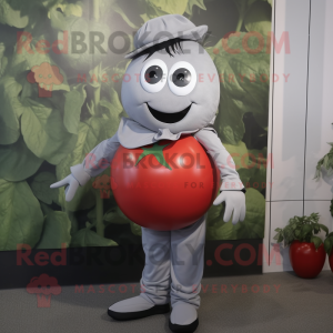 Silver Tomato mascot costume character dressed with a Culottes and Suspenders