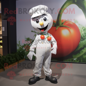 Silver Tomato mascot costume character dressed with a Culottes and Suspenders