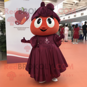 Maroon Apricot mascot costume character dressed with a Blouse and Clutch bags