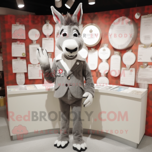 Gray Donkey mascot costume character dressed with a Suit Jacket and Coin purses