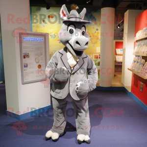 Gray Donkey mascot costume character dressed with a Suit Jacket and Coin purses