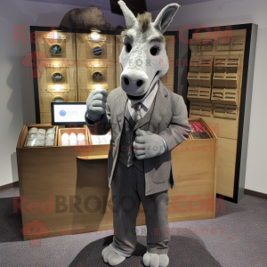 Gray Donkey mascot costume character dressed with a Suit Jacket and Coin purses