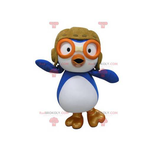 Blue and white bird mascot in airplane pilot outfit -