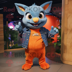 Orange Bat mascot costume character dressed with a Denim Shirt and Lapel pins